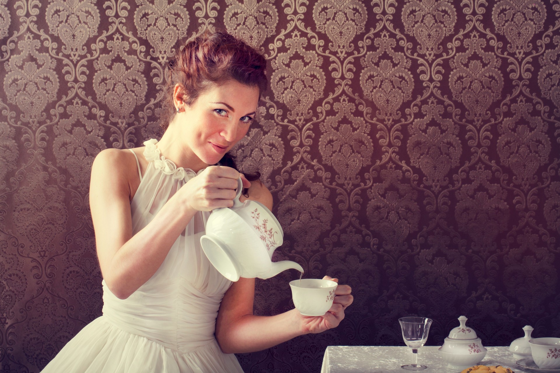 dreamer woman drinking tea at tea time